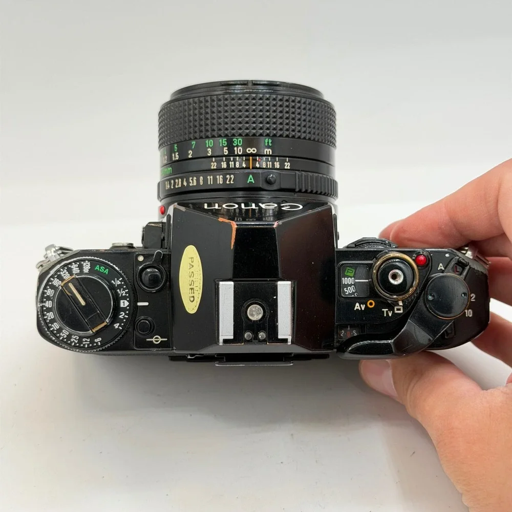 Canon A-1 35mm Film SLR Camera with FD 50mm f/1.4 Lens 1980 Olympics Cap Black